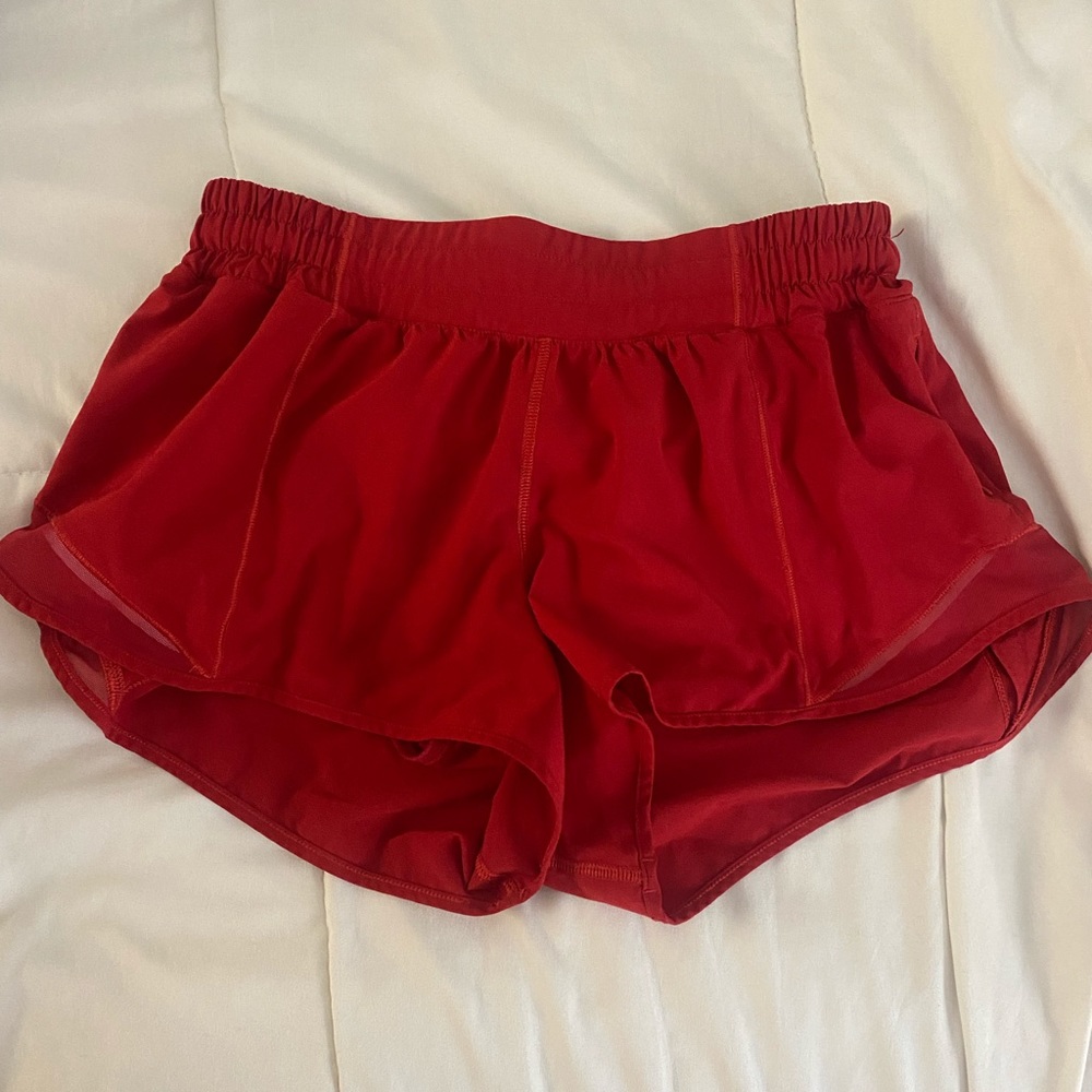 Red hotty hots. Barely worn. Size 8 lululemon. Really good condition. 2.5 inseam